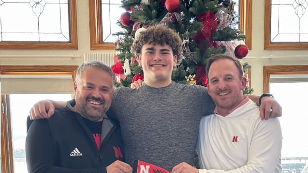 Landen Davidson with Nebraska football head coach Matt Rhule and offensive coordinator Marcus Satterfield